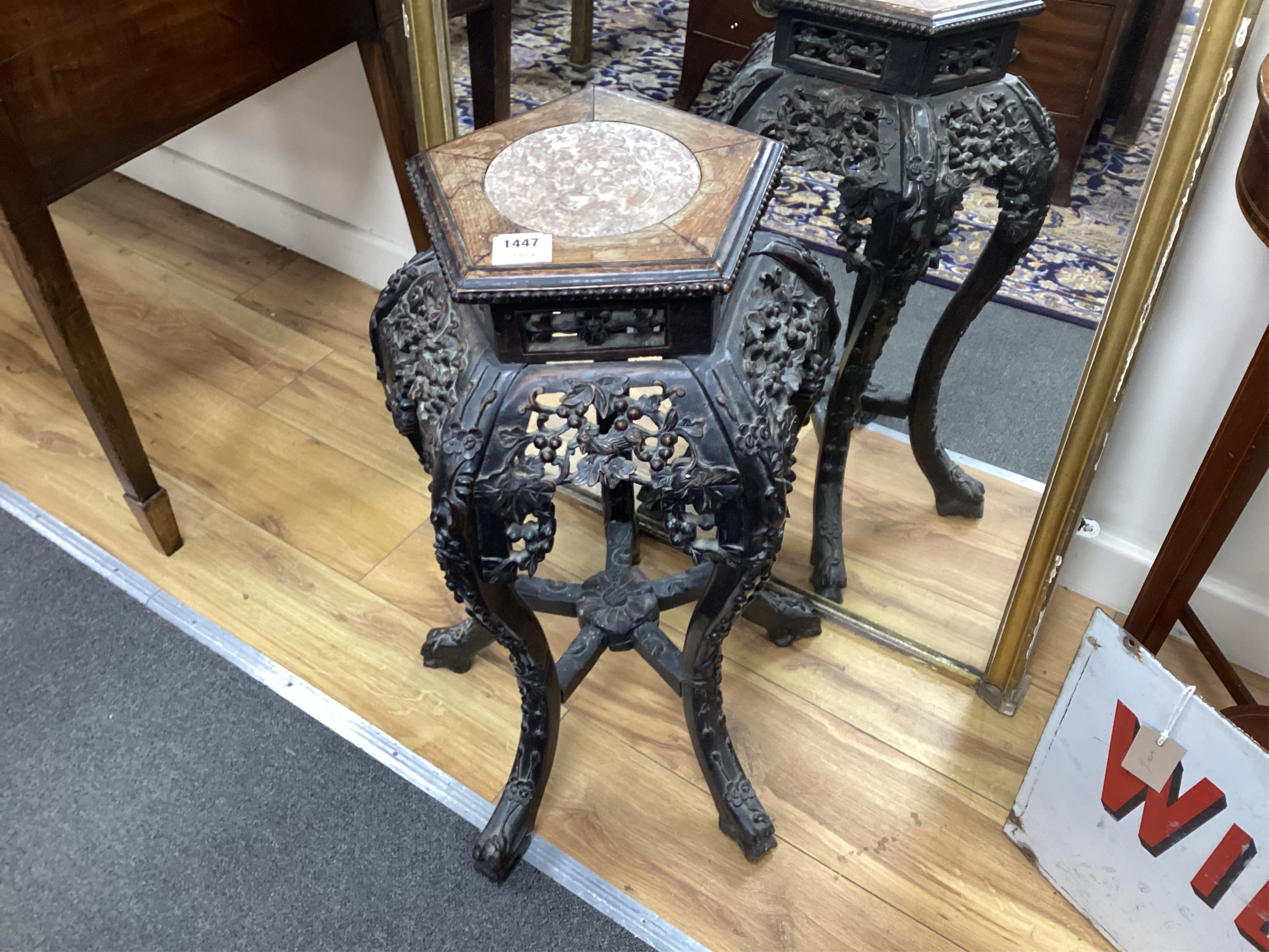A Chinese rosewood and marble inset stand, late Qing dynasty, 67cm high. Condition - fair